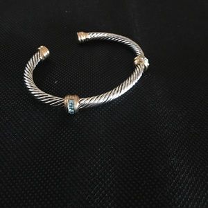 Cable bracelet designer style.