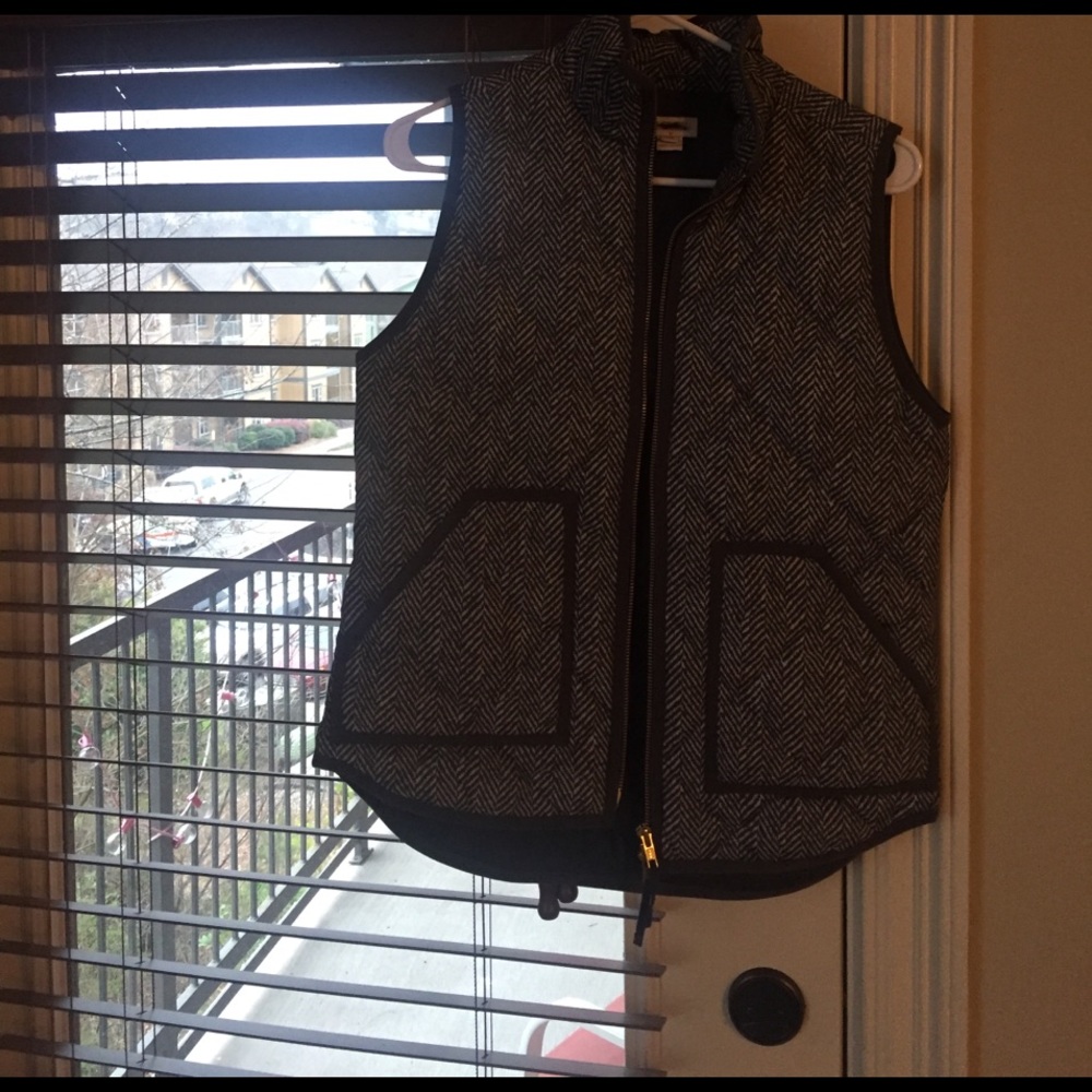 Grey and white puffy vest