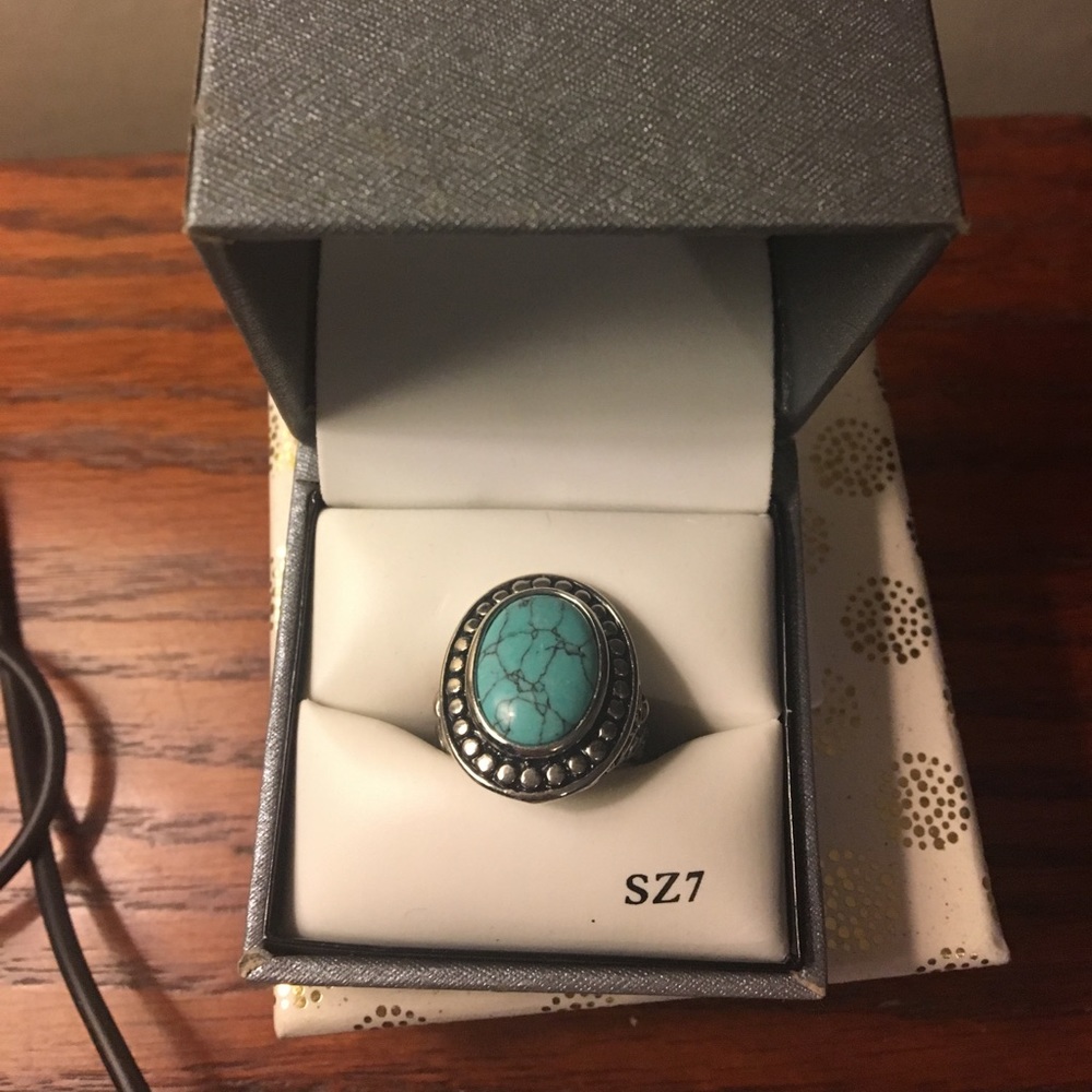 Turquoise ring.