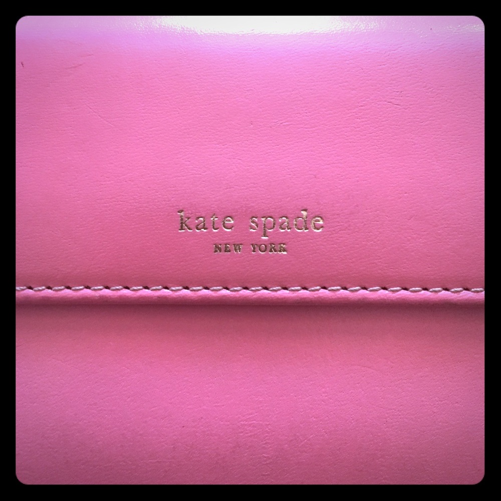 Beautiful pink wallet with green interior, leather