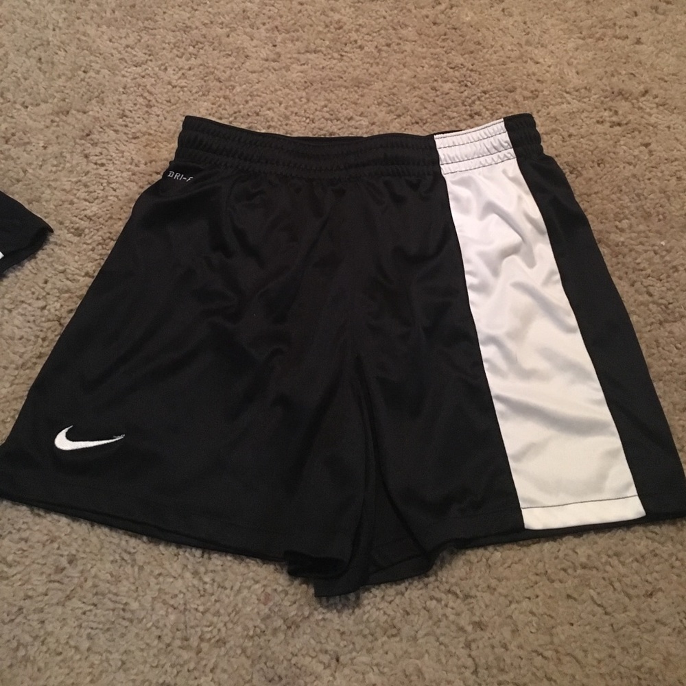 Pair of black and white Nike athletic shorts