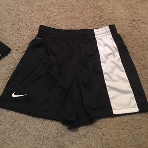 Pair of black and white Nike athletic shorts