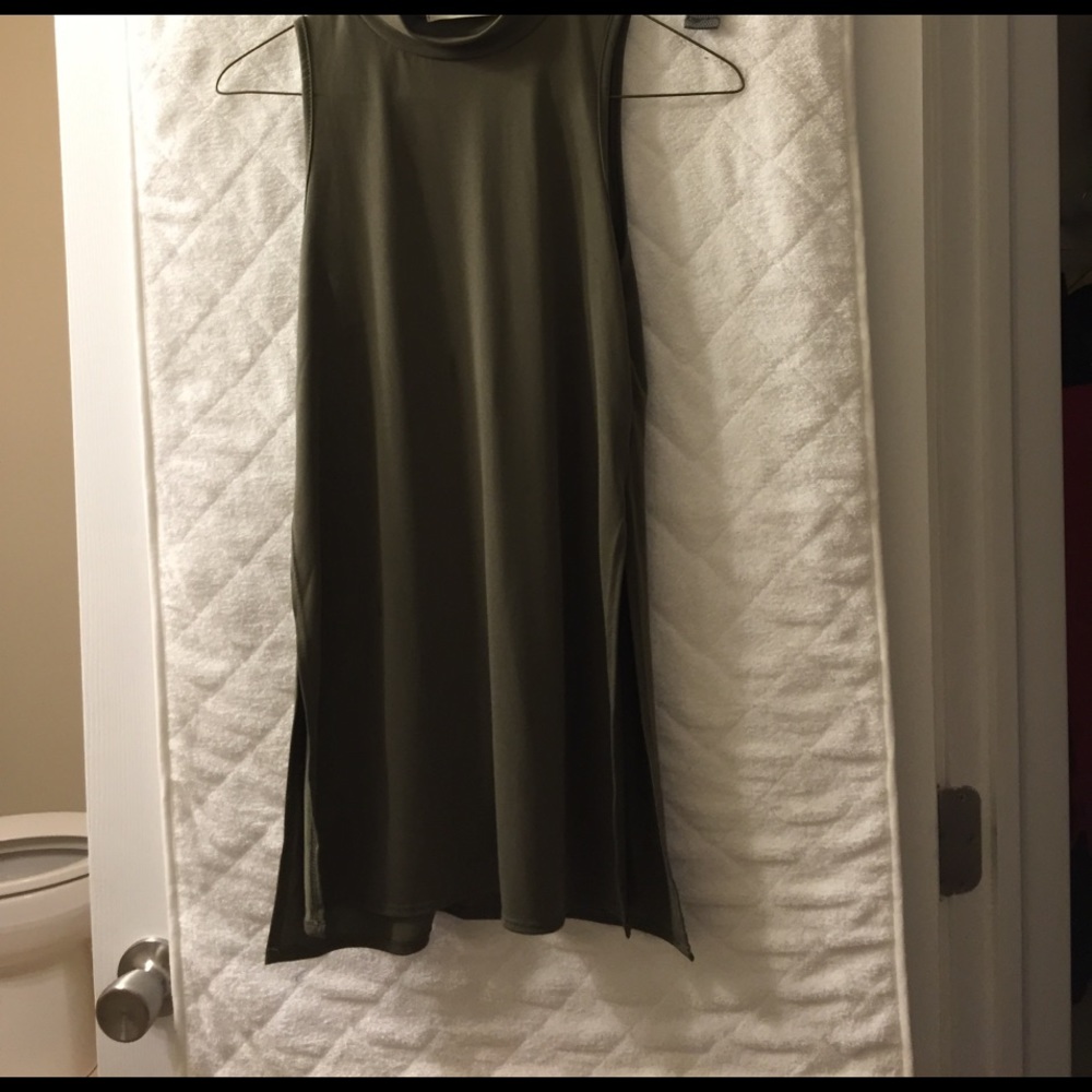 Camo green turtle neck tank with side slits. NWOT