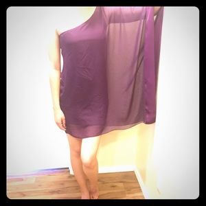 One shoulder dress in purple.