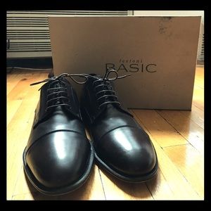 A.testoni Basic cap-toe oxfords