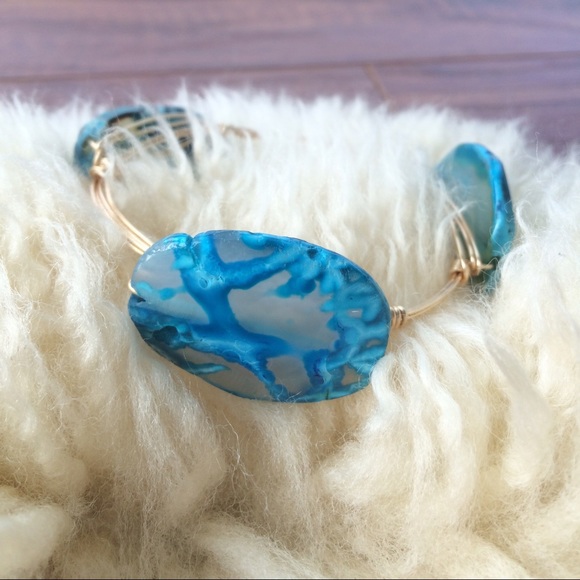 Bangle bracelet with gold fixings - Picture 1 of 1