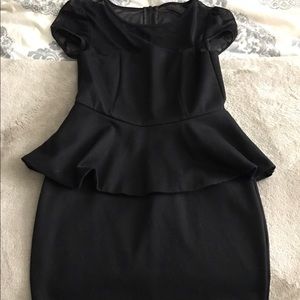 Black peplum body con dress