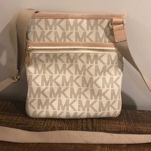 Michael Kors Cross body purse.
