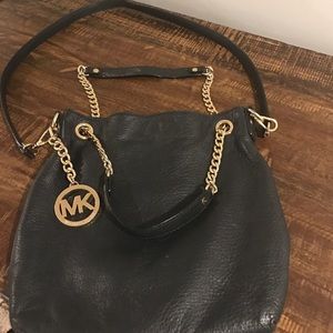 Michael Kors black leather crossbody bag.