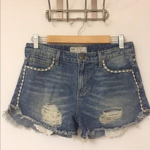 Free people: Denim dolphin shorts w/ details