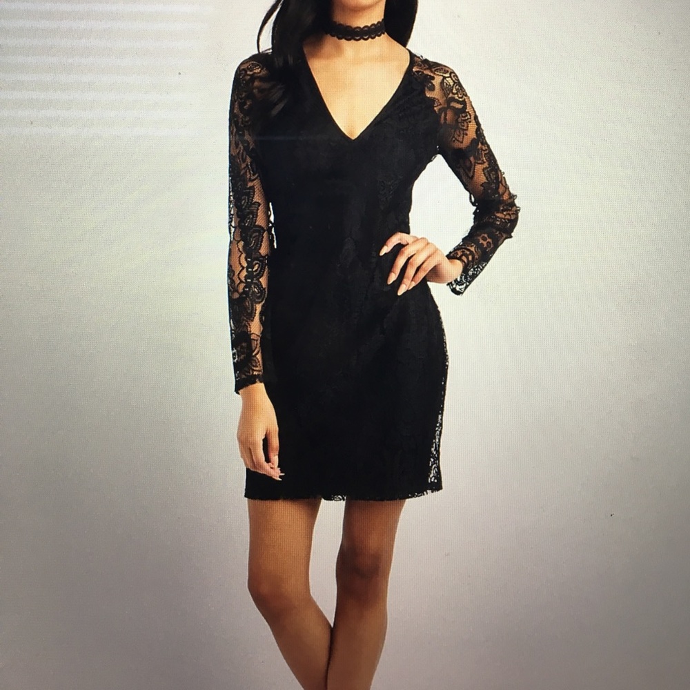 Beautiful lace sleeved black dress