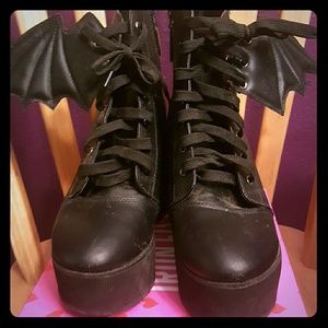 Bat-wing boots. Bat royalty by Ash Costello.