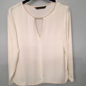 Cream color blouse with faux leather trim