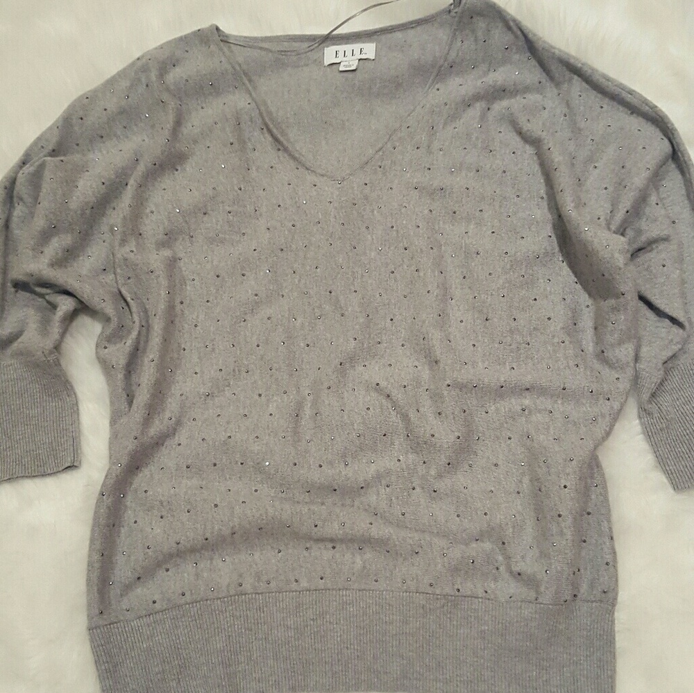 Very pretty and dressy lightweight sweater