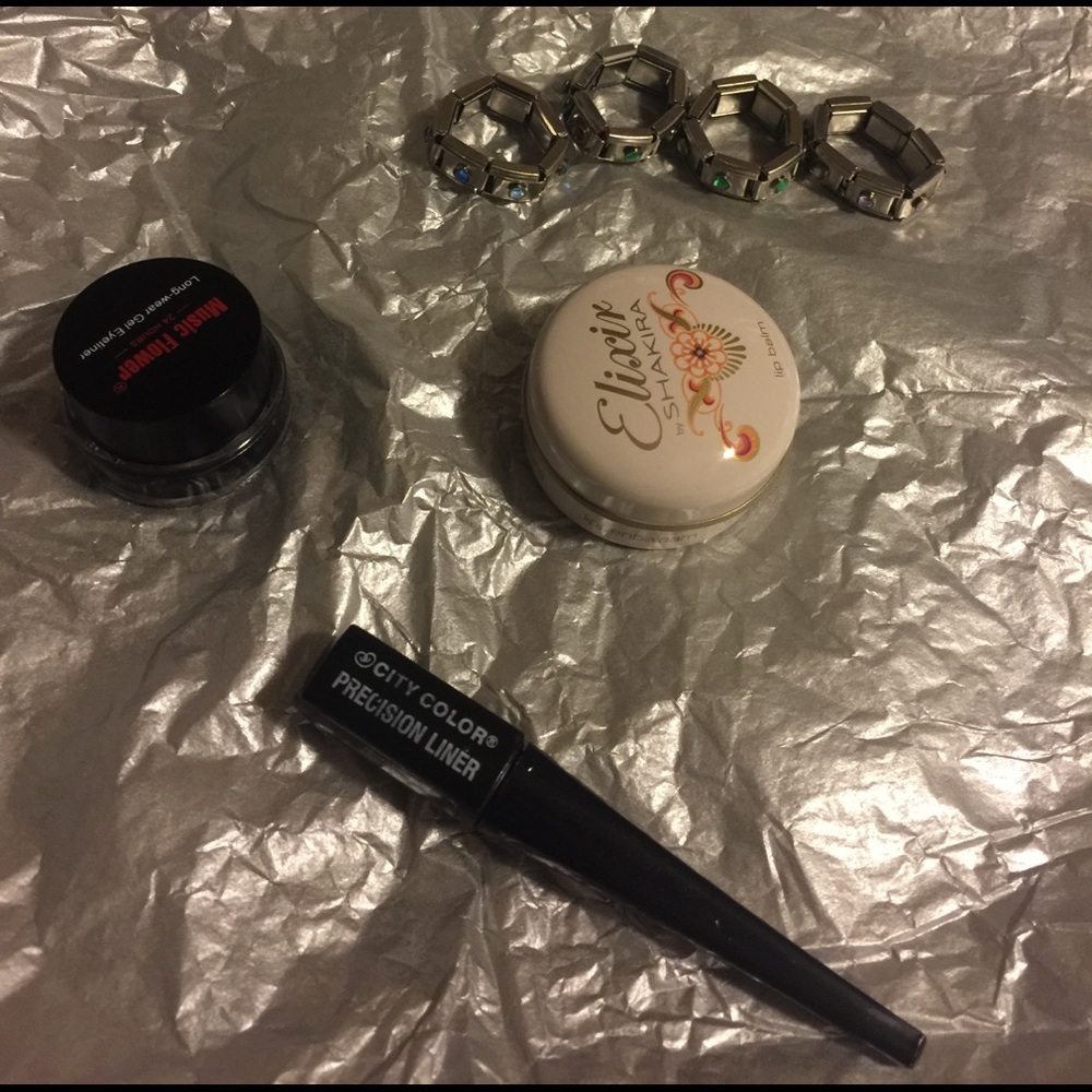 Ring stack, gel eyeliner, liquid eyeliner, lip bam