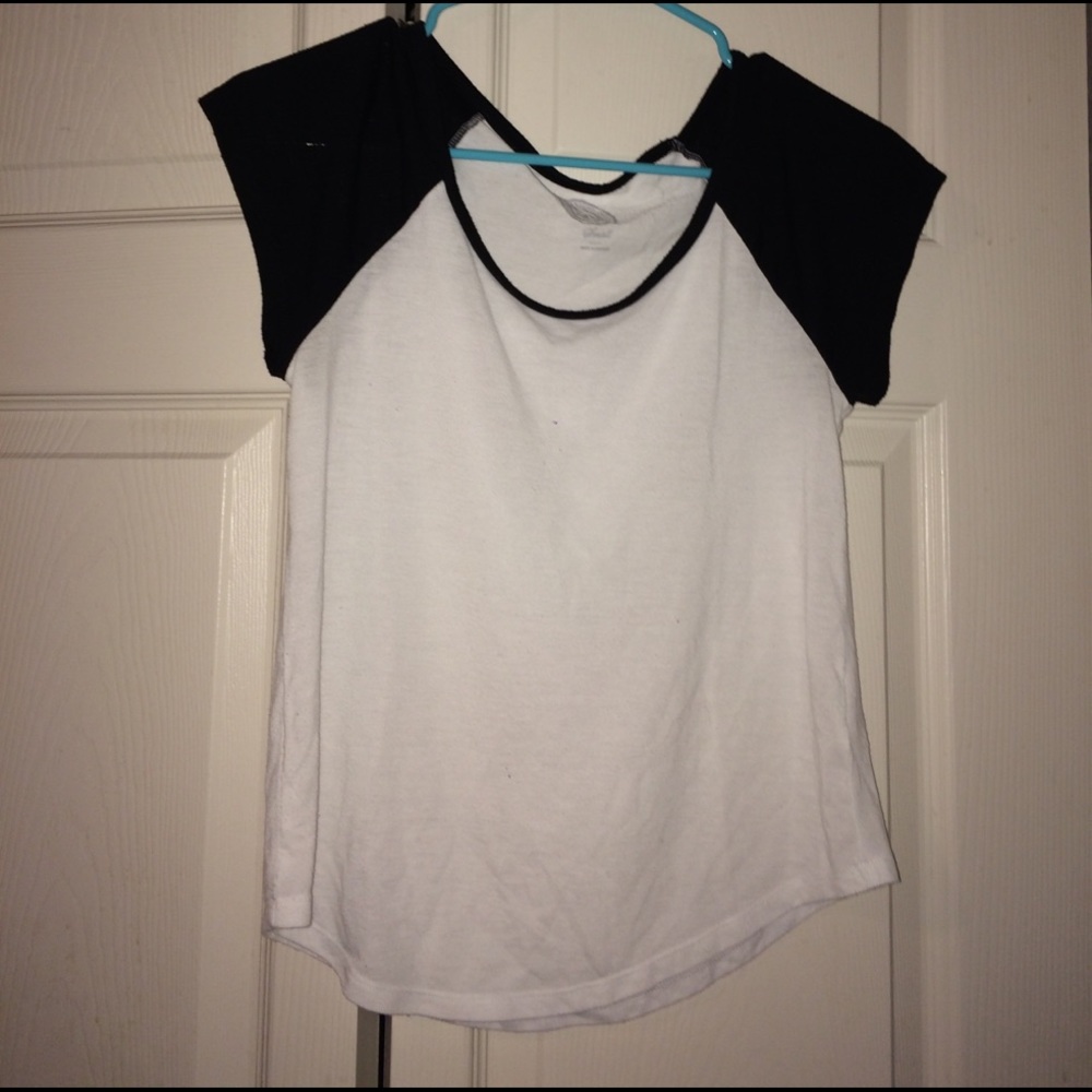 A plain white and black tee. Simple. Cute