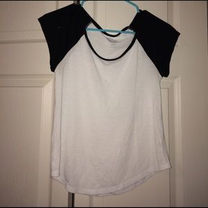 A plain white and black tee. Simple. Cute
