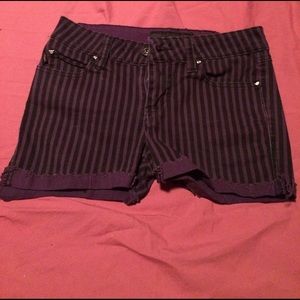 Skelanimals black and purple striped shorts.