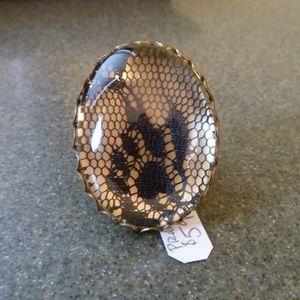 Golden lace ring with black detailing