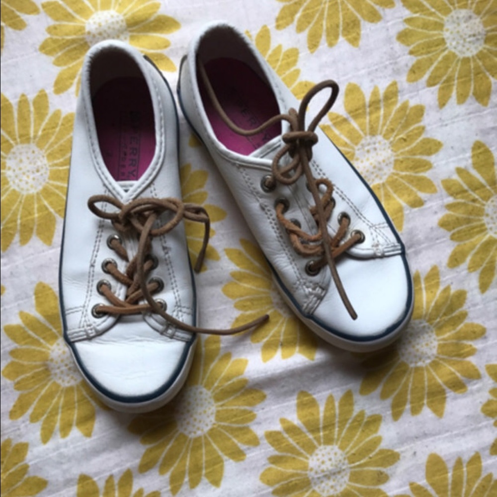White Sperry sneakers