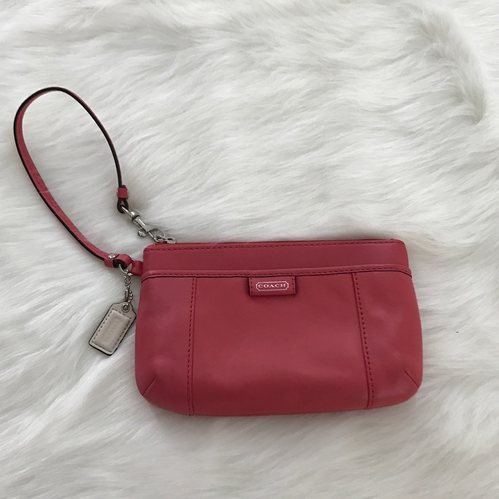 SALE!! Pink/peach Coach Wristlet- like new!