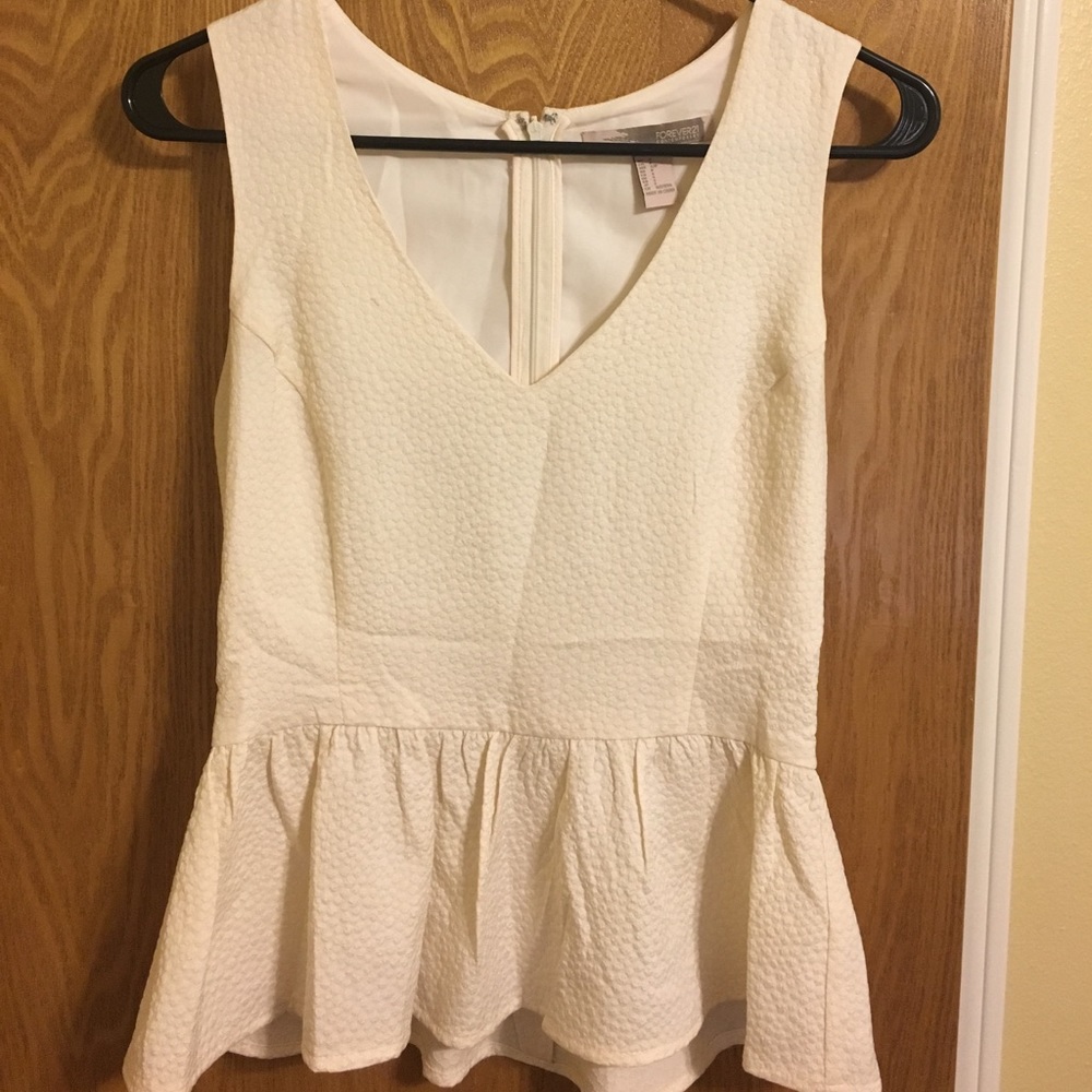 Cream peplum top