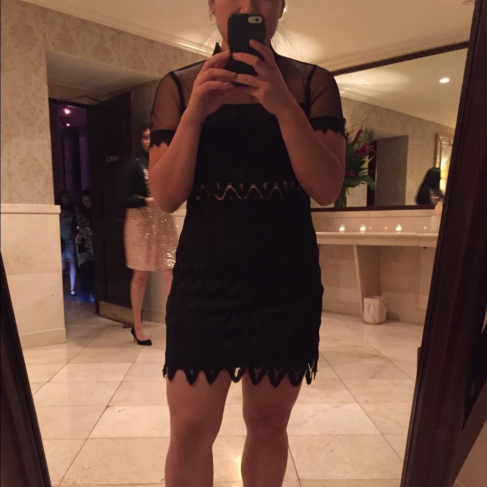 Lace cocktail dress with mesh inserts