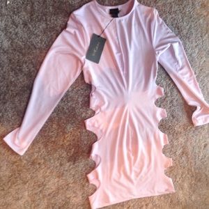 Beautiful pink sheer dress. Side cut outs.