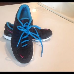 Black Nike running shoes.  Size 8.