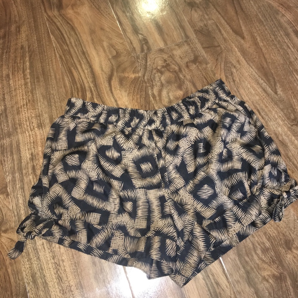Brown geometric squares print shorts w/ leg ties