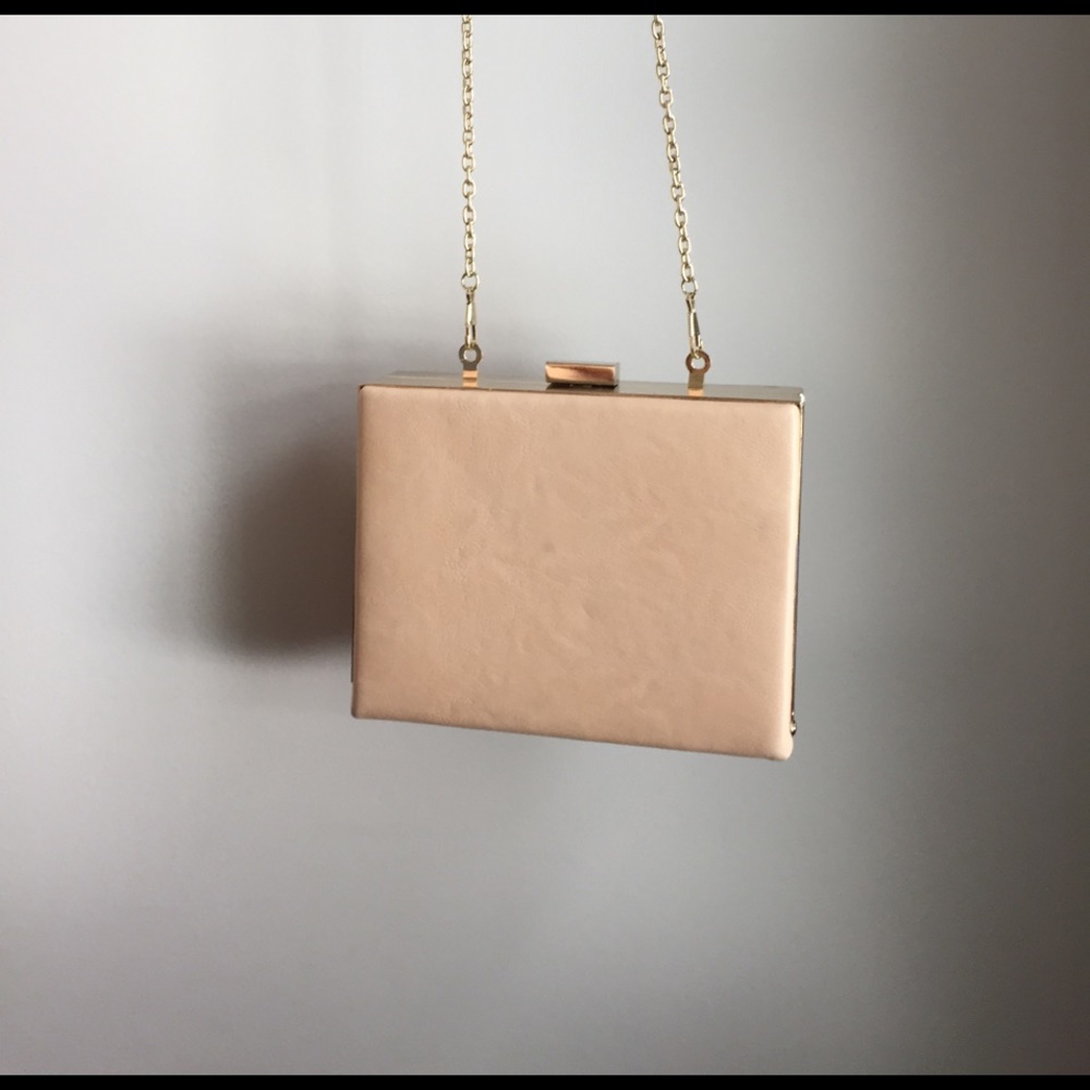 Nude clutch with good hardware!!
