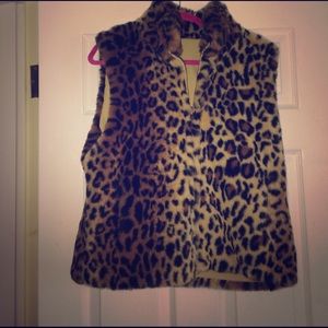 Fuzzy reversible cheetah vest