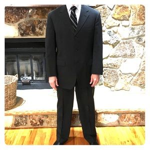 Charcoal grey Brooks Brothers suit.