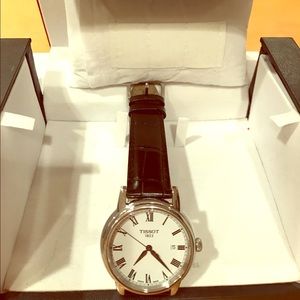 Black leather tissot watch