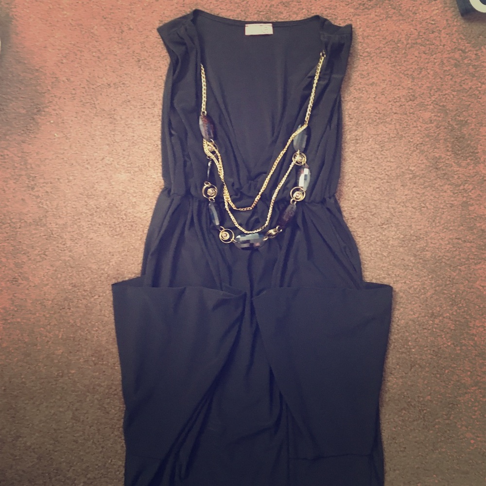 Little black dress with detachable necklace.