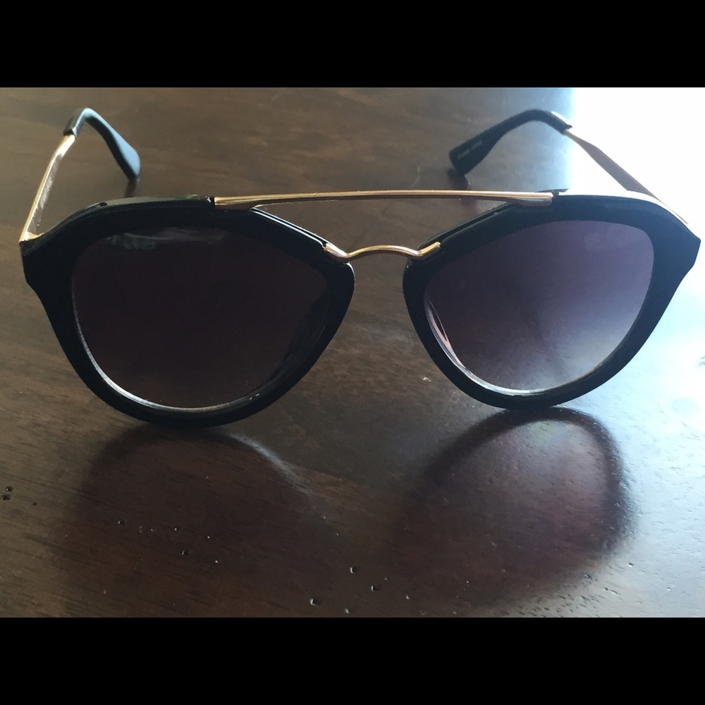 Black Sunglasses with Gold overhead