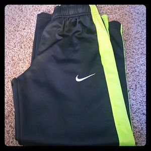 Boys Nike YM running pants.