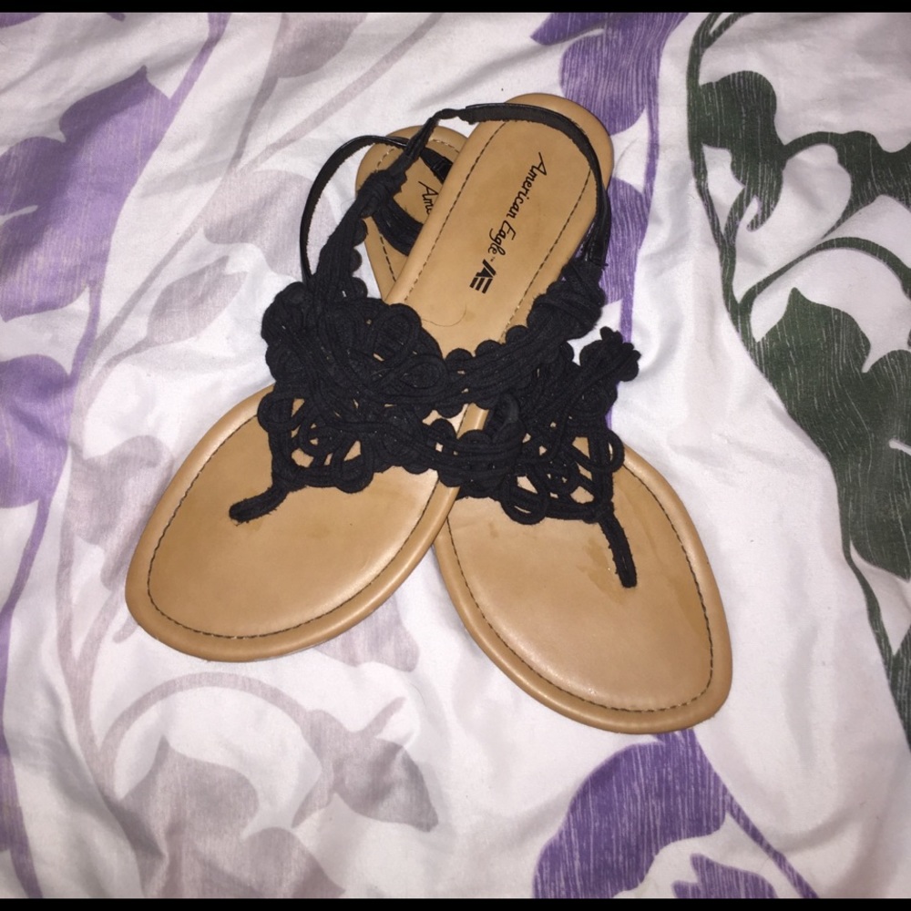 Black strappy flip flops