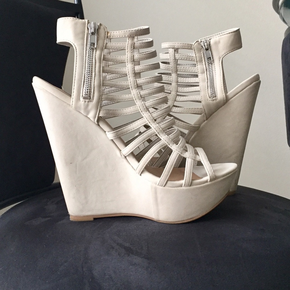 Steve Madden side zip platform wedges. Open toe