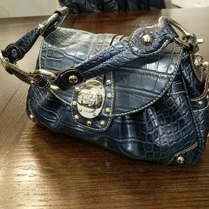 Kathy van zeeland blue snakeprint bag