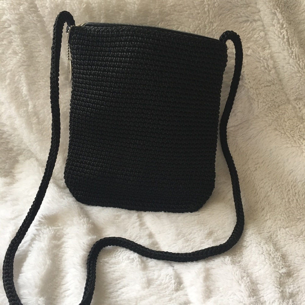 The SAK black woven cross body bag