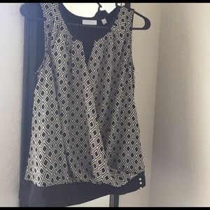Sleeveless black patterned top