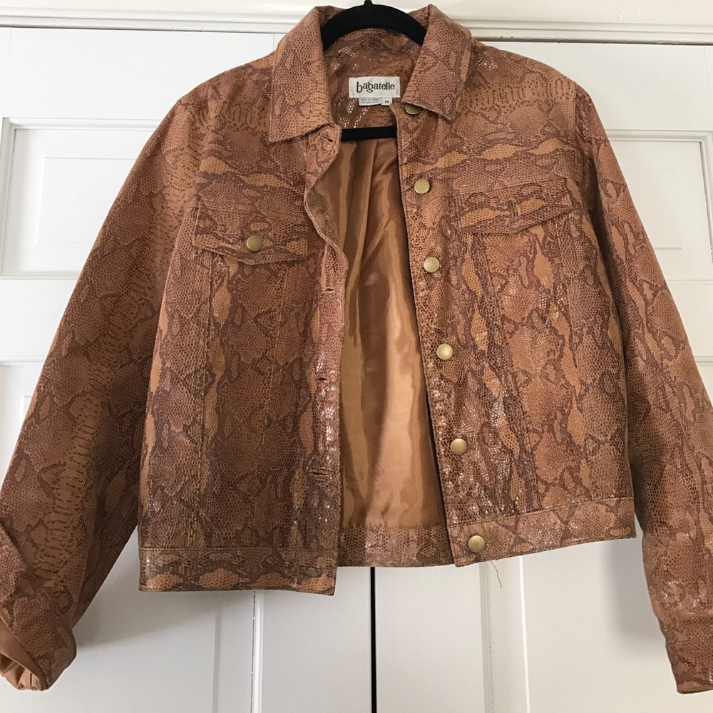 100% leather lightly worn jean style jacket
