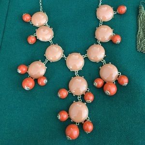 Classic Bubble necklace in coral color. 