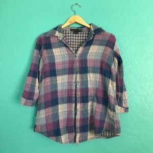 Purple tones, plaid shirt.