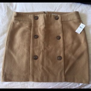 Tan colored GAP skirt with brown buttons
