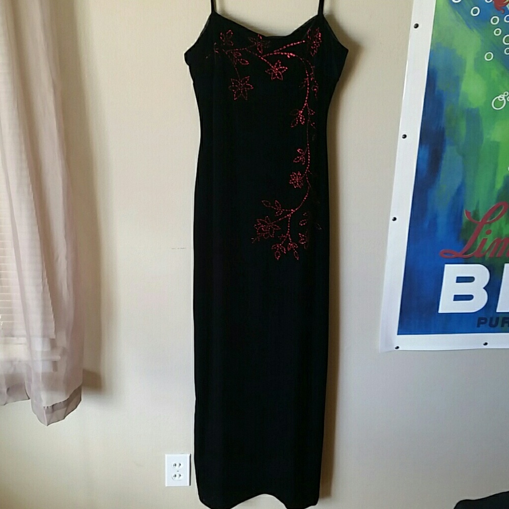 Black velvet ballgown with sparkling red detail