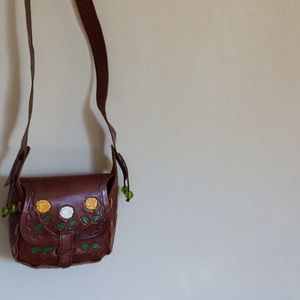 Little brown purse with painted roses