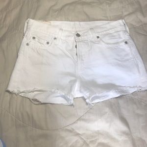 White Levi cutoffs