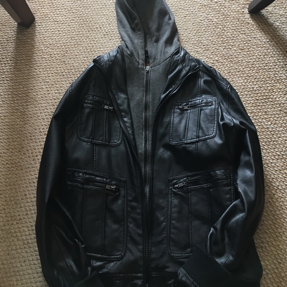 Black pleather jacket with a built on hoodie
